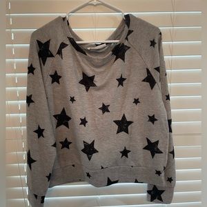 soft grey sweater with black stars